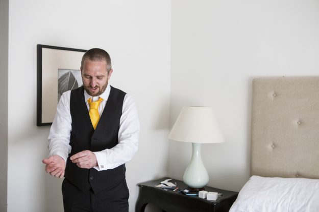 The groom getting ready