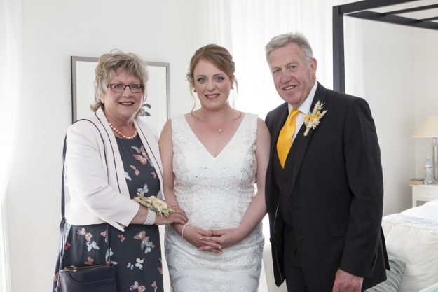 Parents with daughter before service
